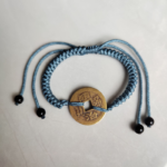 Five Emperor Coins Dusty Blue Cord Bracelet handmade with traditional Vajra Knot, adjustable Chinese Feng Shui jewelry for protection.