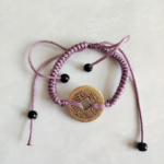 Five Emperor Coins Grey Purple Cord Bracelet handmade with traditional Vajra Knot, adjustable Chinese Feng Shui jewelry for protection.