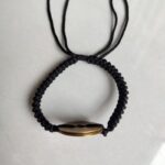 Five Emperor Coins Black Cord Bracelet handmade with traditional Vajra Knot, adjustable Chinese Feng Shui jewelry for protection.