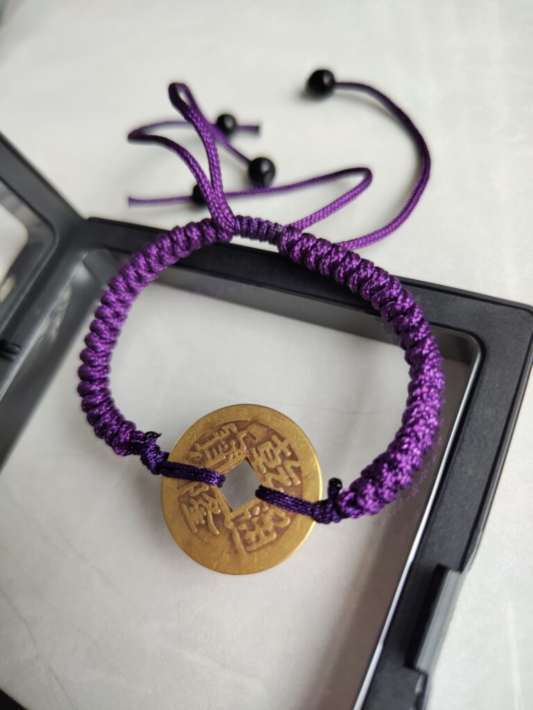 Five Emperor Coins Deep Purple Cord Bracelet handmade with traditional Vajra Knot, adjustable Chinese Feng Shui jewelry for protection.
