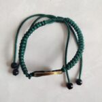 Five Emperor Coins Forest Green Cord Bracelet handmade with traditional Vajra Knot, adjustable Chinese Feng Shui jewelry for protection.
