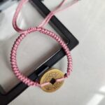 Five Emperor Coins Grey Purple Cord Bracelet handmade with traditional Vajra Knot, adjustable Chinese Feng Shui jewelry for protection.