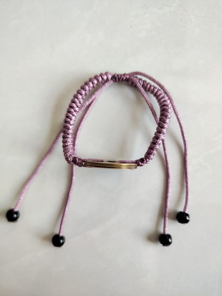 Five Emperor Coins Grey Purple Cord Bracelet handmade with traditional Vajra Knot, adjustable Chinese Feng Shui jewelry for protection.