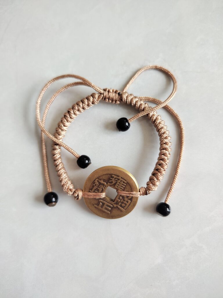 Five Emperor Coins Khaki Cord Bracelet handmade with traditional Vajra Knot, adjustable Chinese Feng Shui jewelry for protection.
