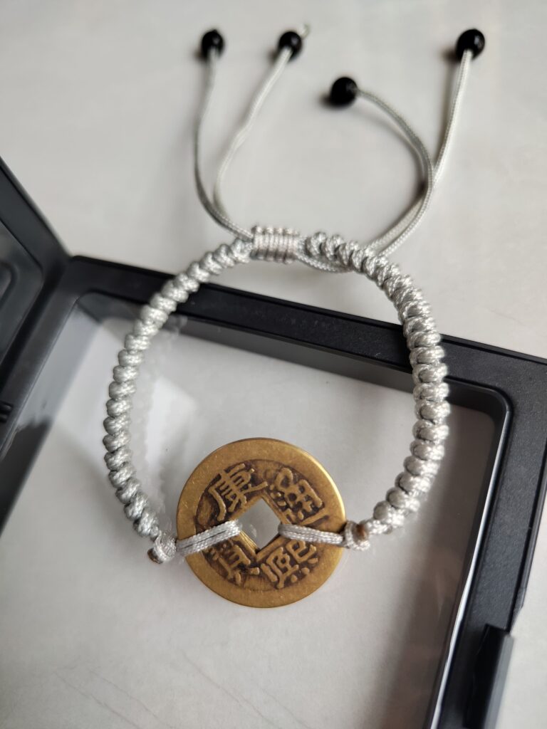 Five Emperor Coins Silver Grey Cord Bracelet handmade with traditional Vajra Knot, adjustable Chinese Feng Shui jewelry for protection.